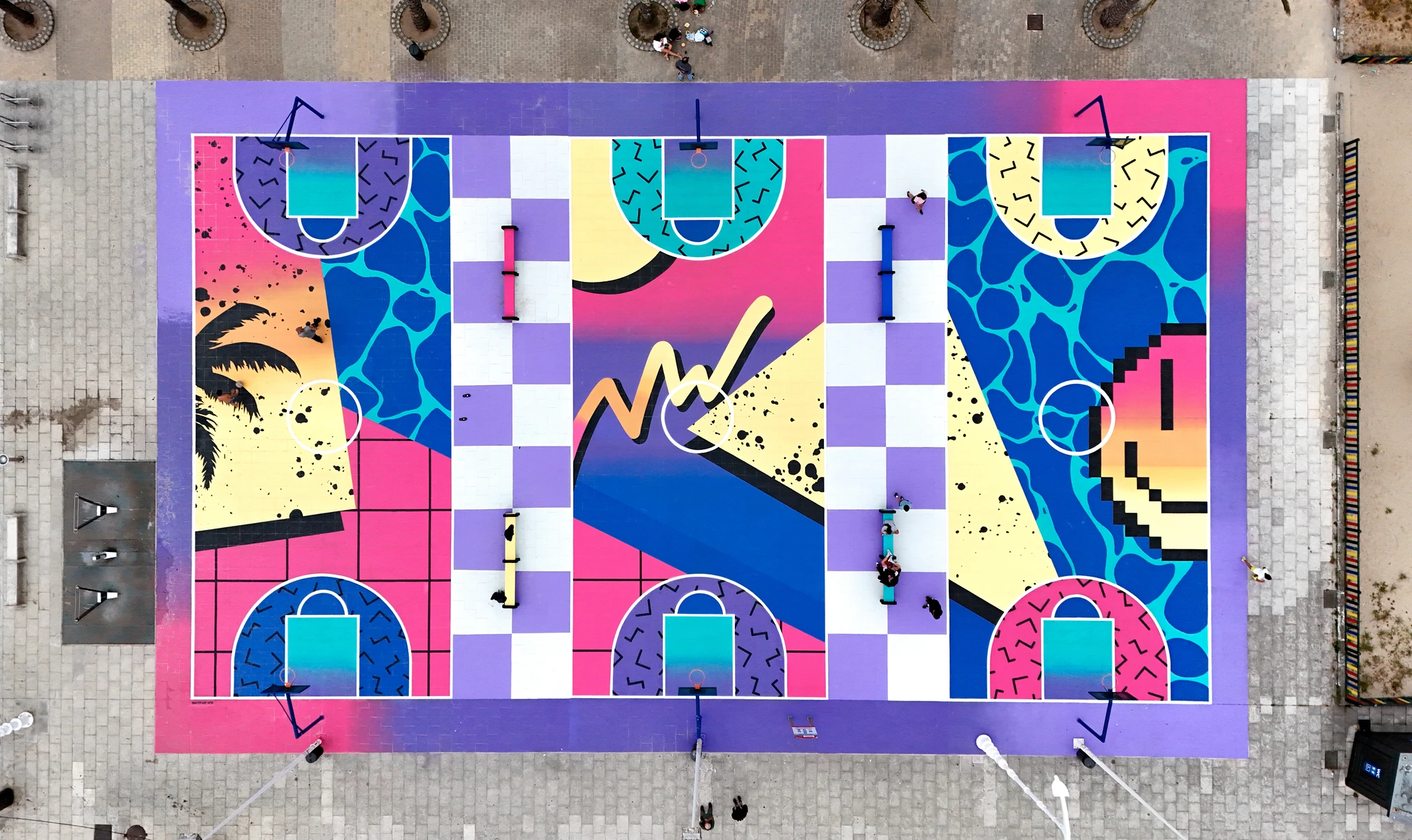 Colorful basketball court mural by Adrián Balastegui